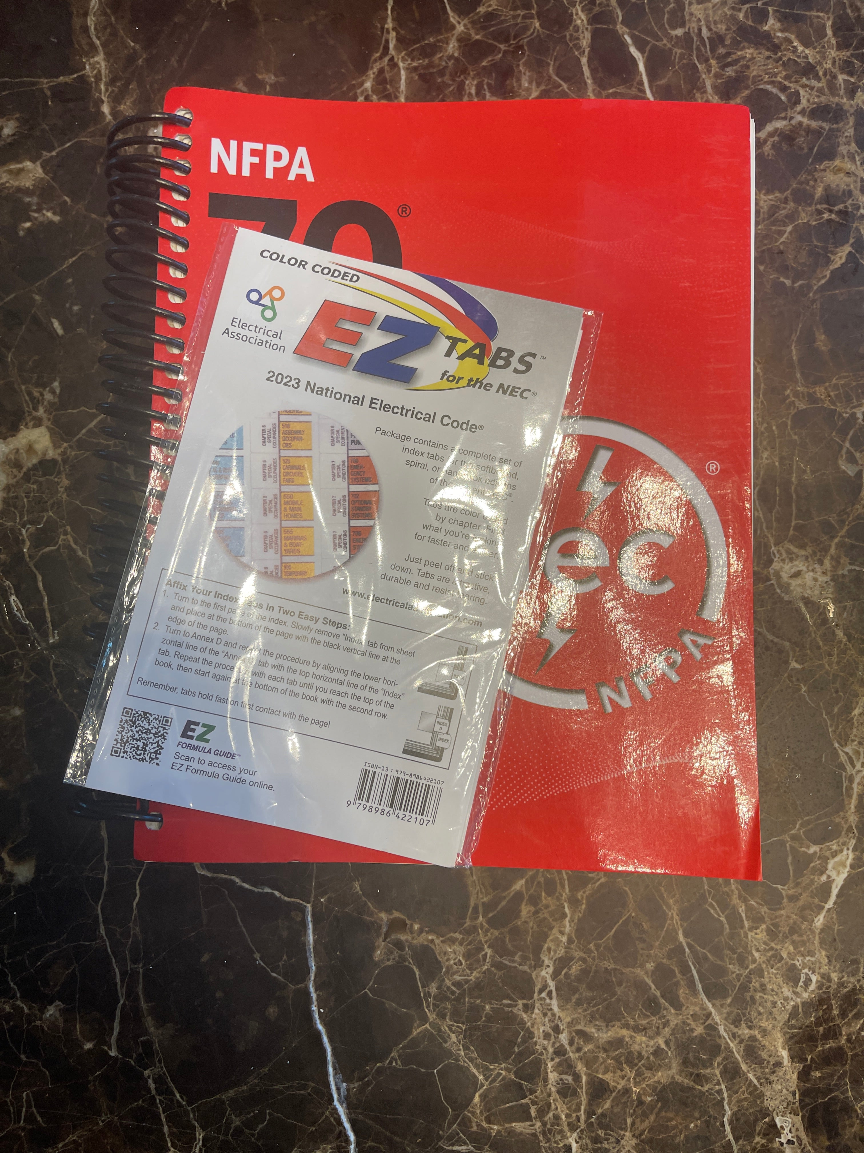 NFPA 70, National Electrical Code, 2023 Edition, Spiralbound With Index Tab + Ugly’s Electrical References, 2023 Edition Spiral-bound
