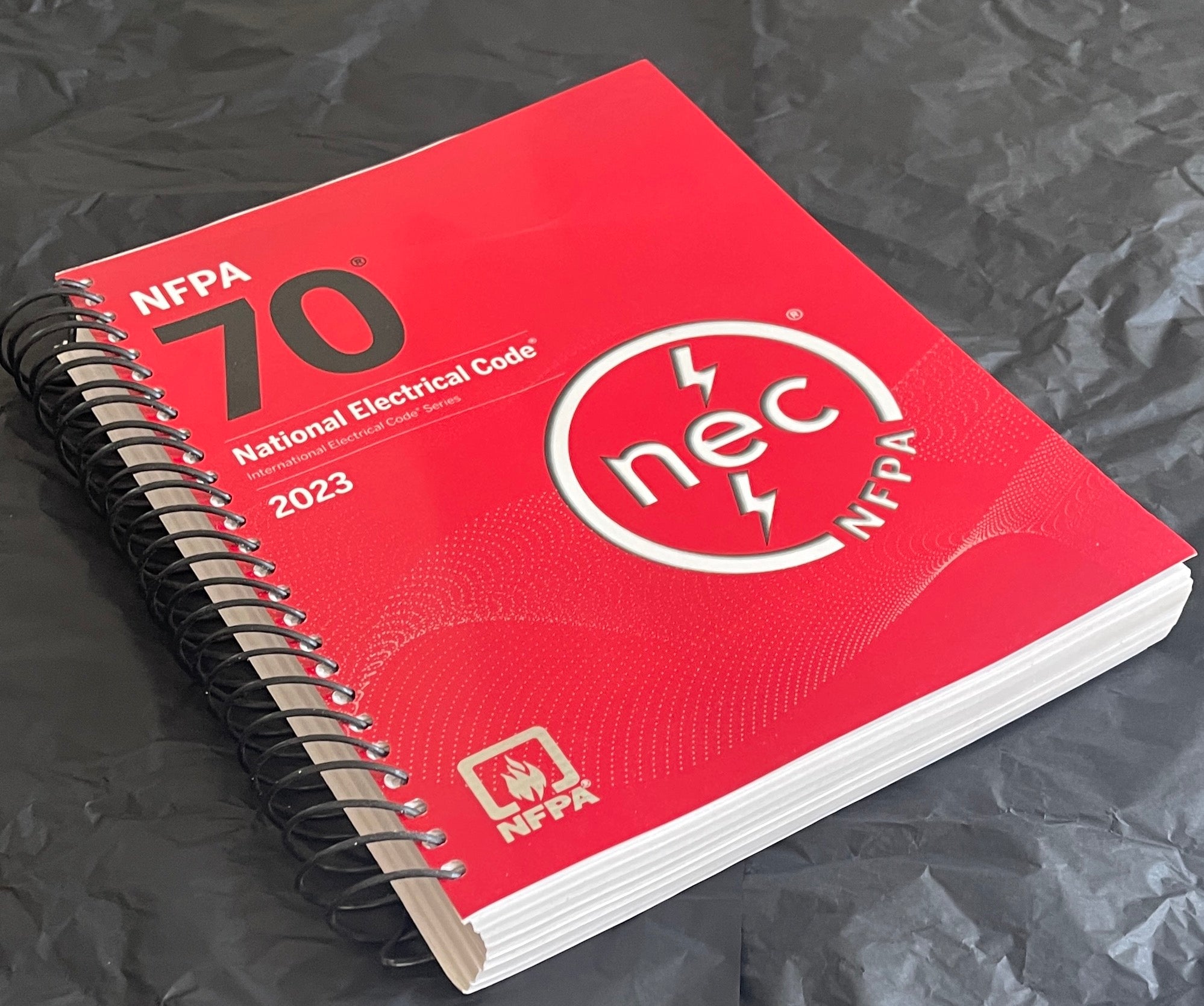 NFPA 70, National Electrical Code, 2023 Edition, Spiralbound With Index Tab + Ugly’s Electrical References, 2023 Edition Spiral-bound